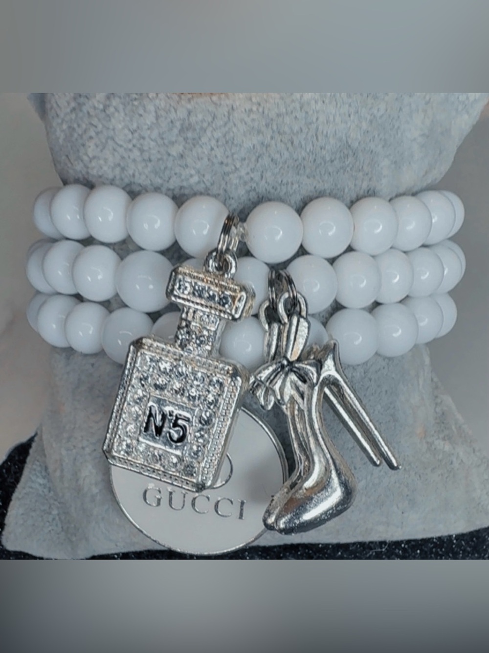 White Beaded Charm Bracelet with Silver Tone Charms